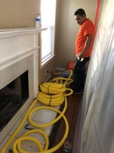 Technician Performing Water Extractions In A Residential Property